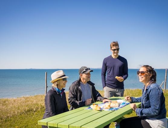 Family picnicking in the Îles de la Madeleine