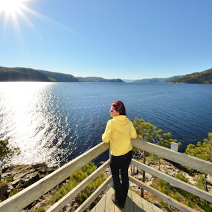 Woman admiring the Saguenay Fjord