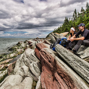 Tourists on the rocks on Île aux Lièvres