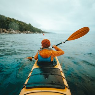 Sea kayakist in Forillon National Park