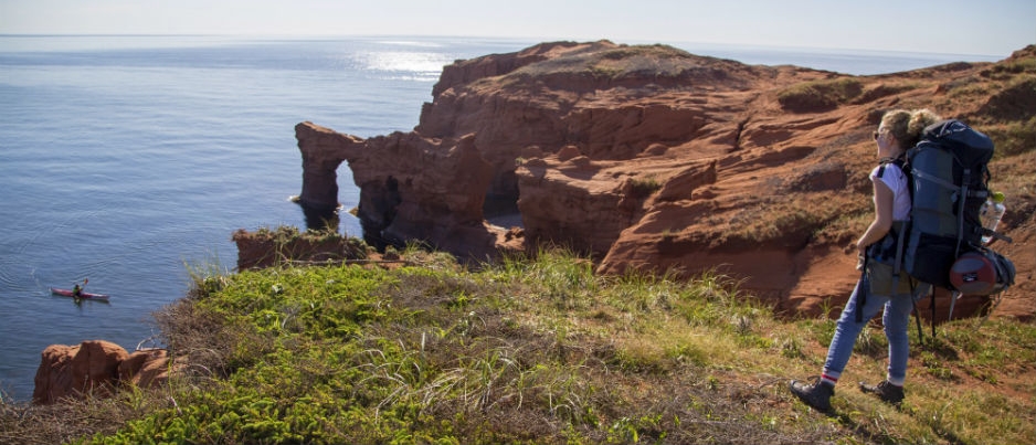 The Islands are surrounded by impressive red sandstone cliffs - Photo Credit: Paddle Tales What Awaits You in the Îles de la Madeleine…
