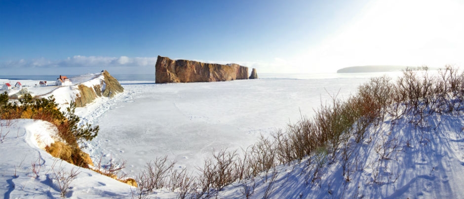 Percé Rock trapped in ice - Photo Credit: Studio du Ruisseau 3 Good Reasons to Visit Gaspésie in the Winter