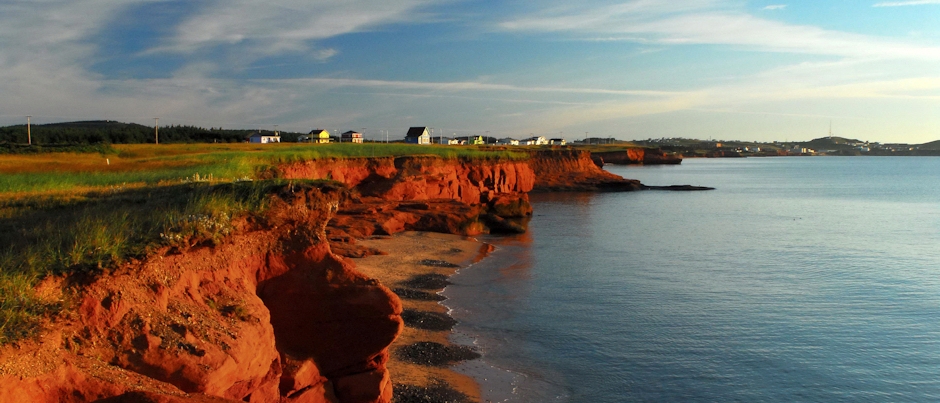 The red cliffs of the Îles de la Madeleine - Photo Credit: Michel Bonato/Tourisme Îles de la Madeleine Why Are the Cliffs of the Îles de la Madeleine Red?