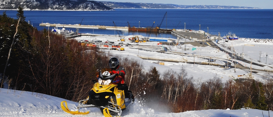 Snowmobiling on the trails of Côte-Nord - Photo Credit: Marc Loiselle Interview with a Snowmobiler: Serge Charrette on Côte-Nord
